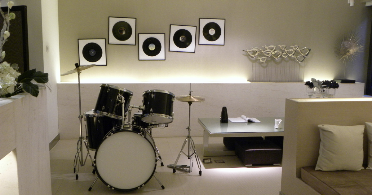 finished basement with a drum setup